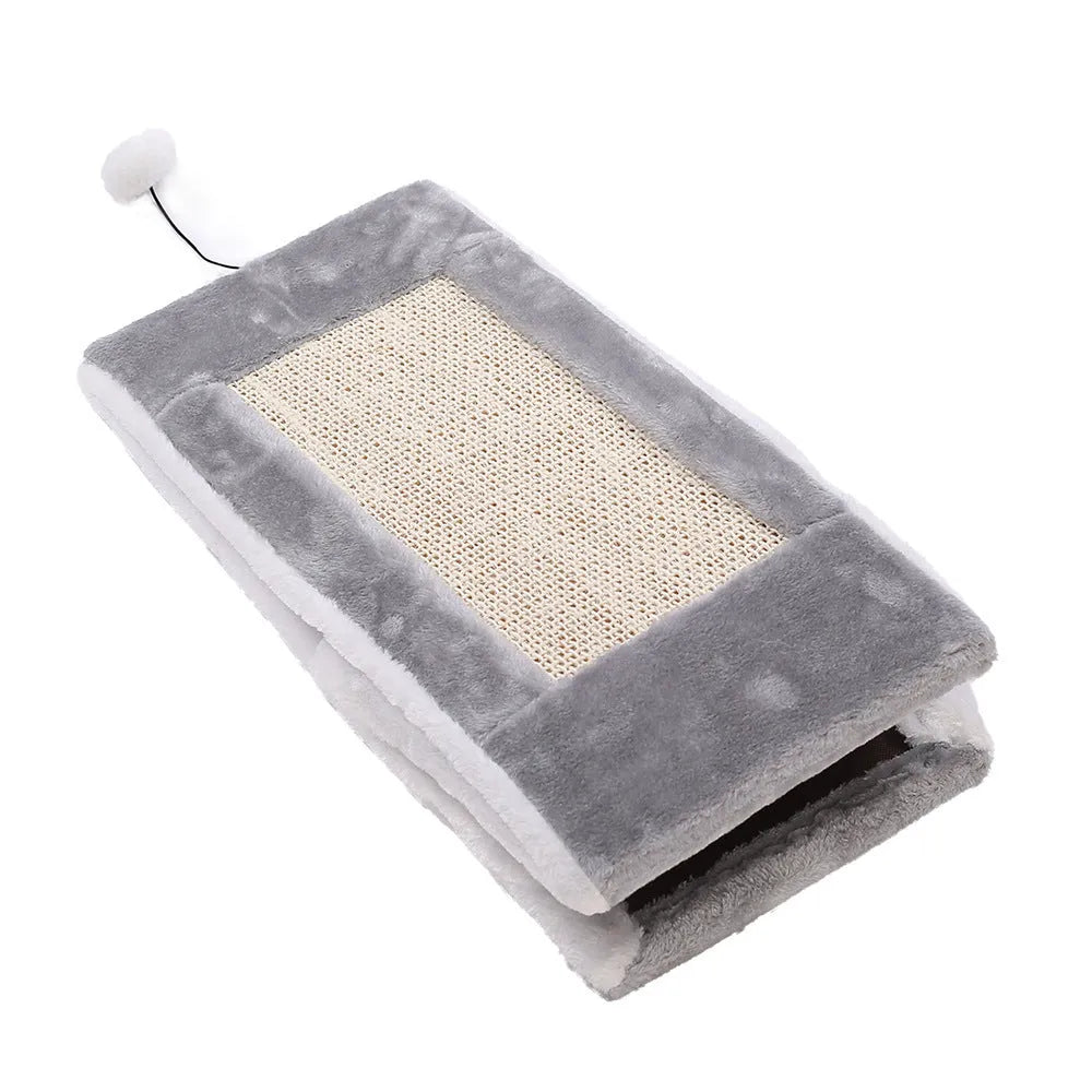 Triangle-shaped cat scratching post and enclosed bed in grey and white colour combination.