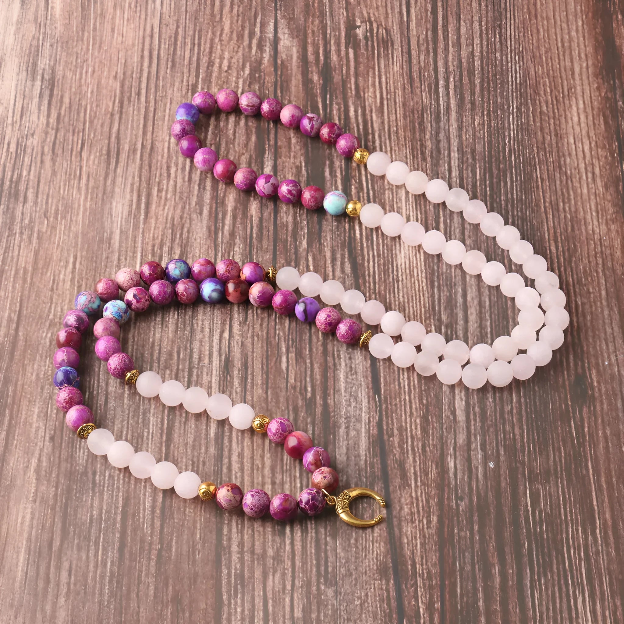 Pink crystal emperor stone round pendant necklace for casual unisex wear