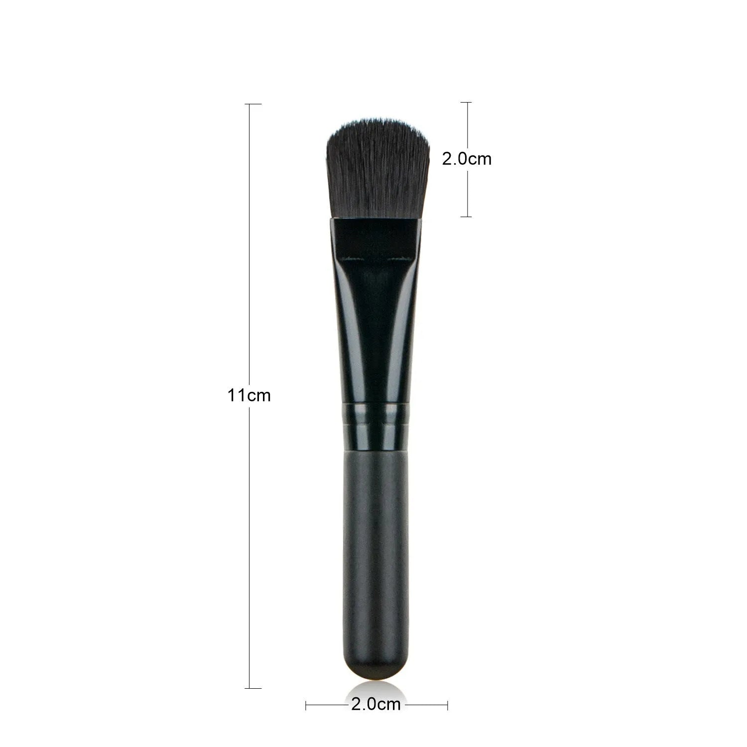 Wooden handle portable facial treatment brush with artificial fibre bristles on white background