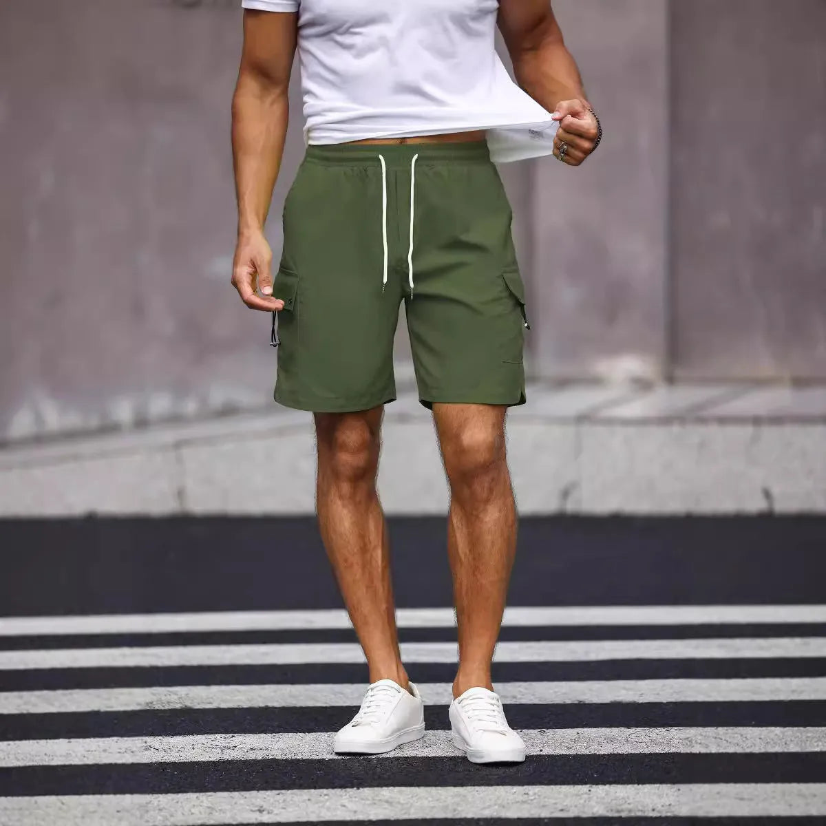 Men's straight-leg workwear shorts in cool silk cotton fabric, available in fluorescent green and army green colours