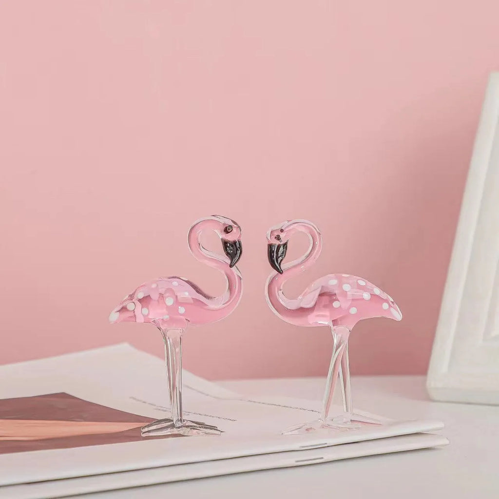 Pink crystal flamingo decorative ornament on tabletop with modern simplicity style