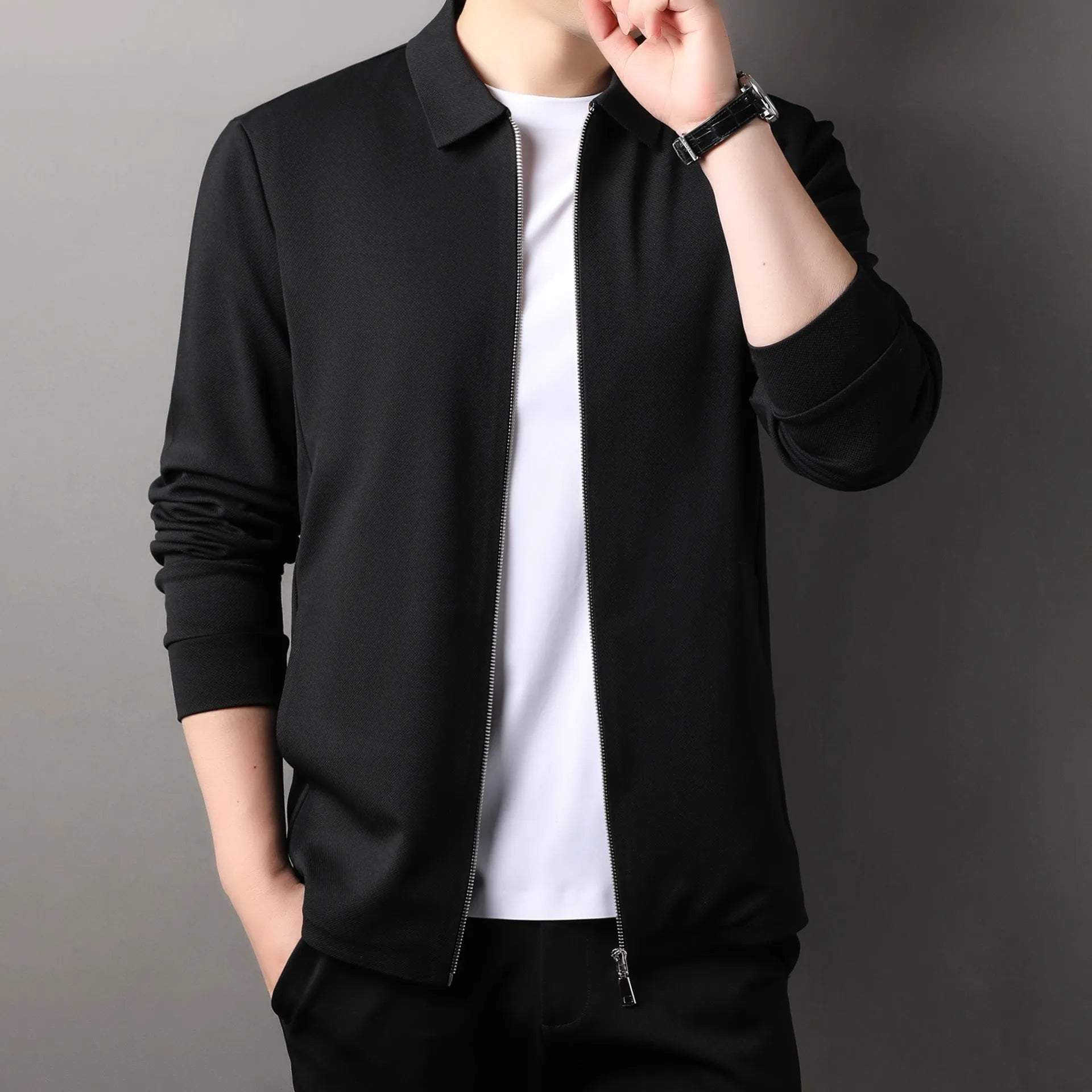 Men's casual business jacket in black, dark grey, or apricot with long sleeves and a straight hem.