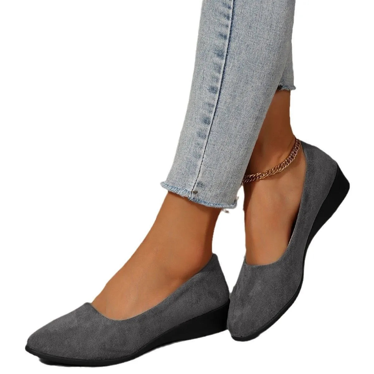 Women's pointed toe wedge pumps in suede with a low heel and shallow mouth opening.