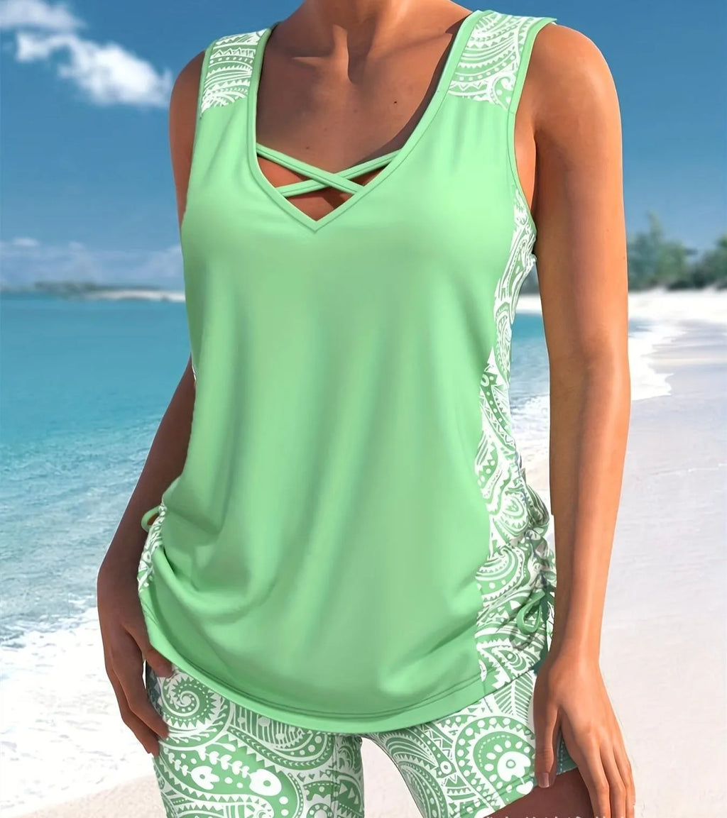 Women's printed split boxer swimsuit set with separate top and shorts in polyester fabric