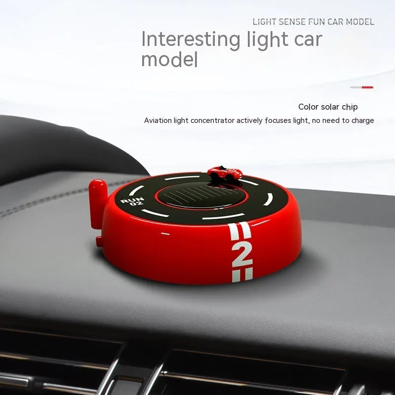 Round black solar-powered car perfume diffuser with USB port on a car dashboard.