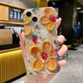 Yellow soft silicone phone case with oil painting floral design and rhinestone decorations