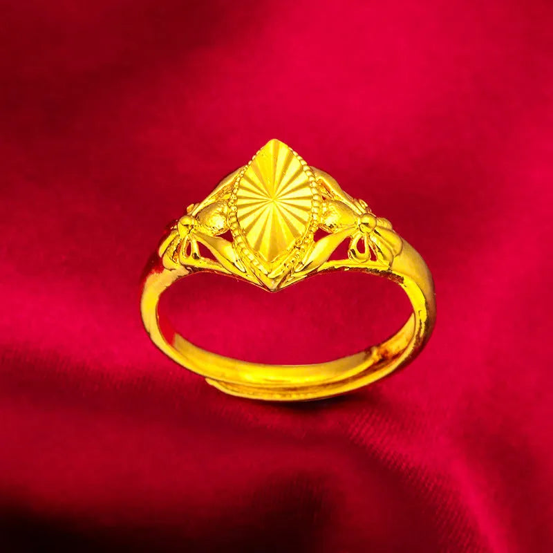 Geometric open ring with textured diamond flower pattern in electroplated gold finish