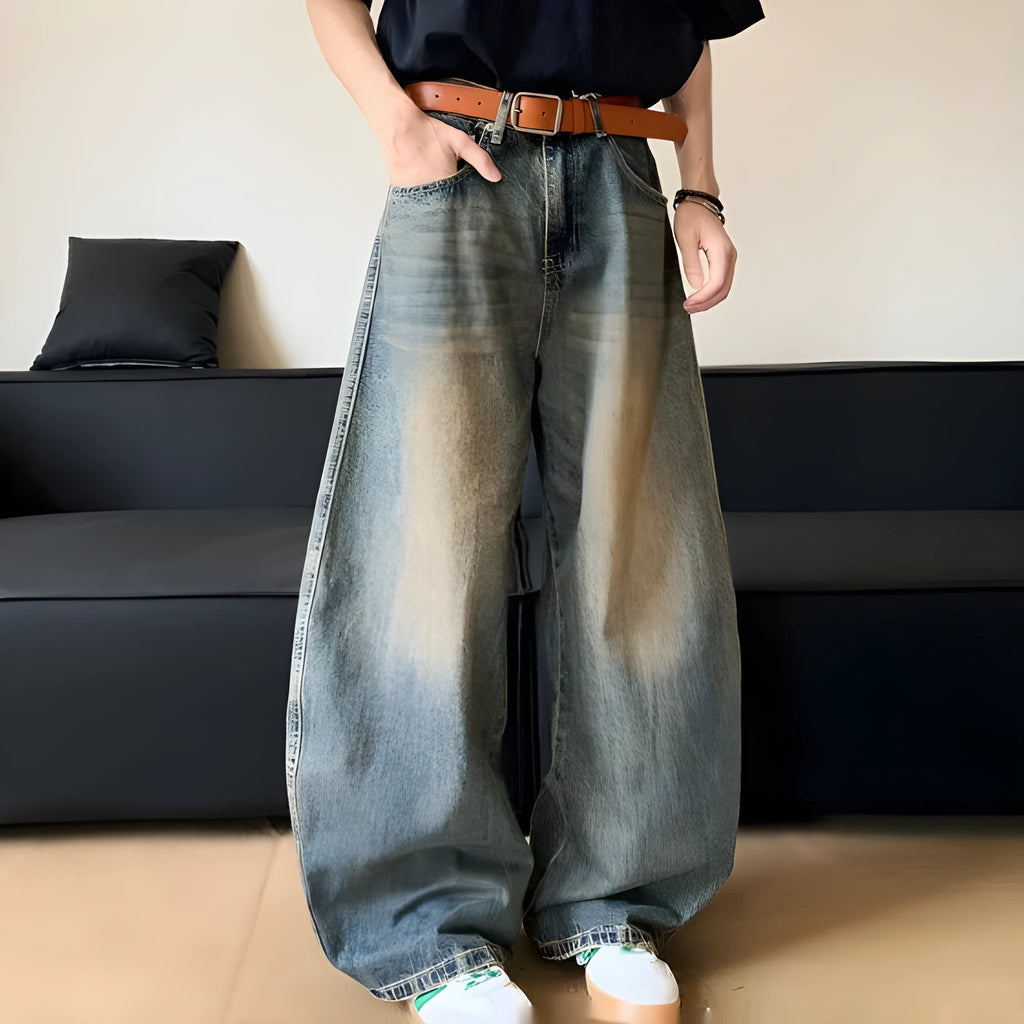 Men's retro blue distressed denim jeans with wide-leg silhouette and micro elasticity fabric