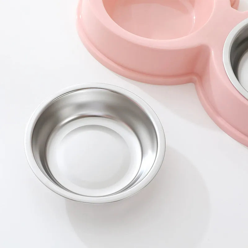 Stainless steel pet double feeding bowl in blue, green, or pink colour for cats and dogs.