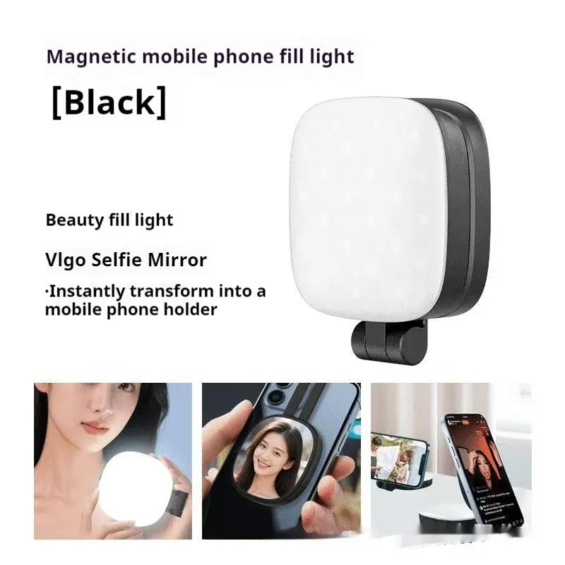 Black mini portable fill light with dial control magnetically attached to a mobile phone.