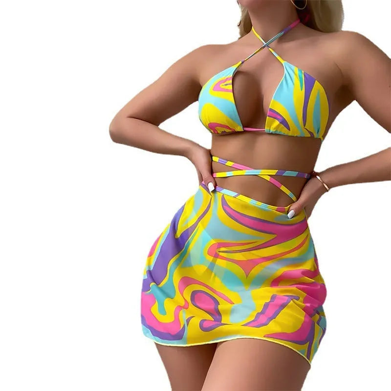 Yellow striped halter-neck swimsuit set for women with lace-up front, includes skirt and shorts