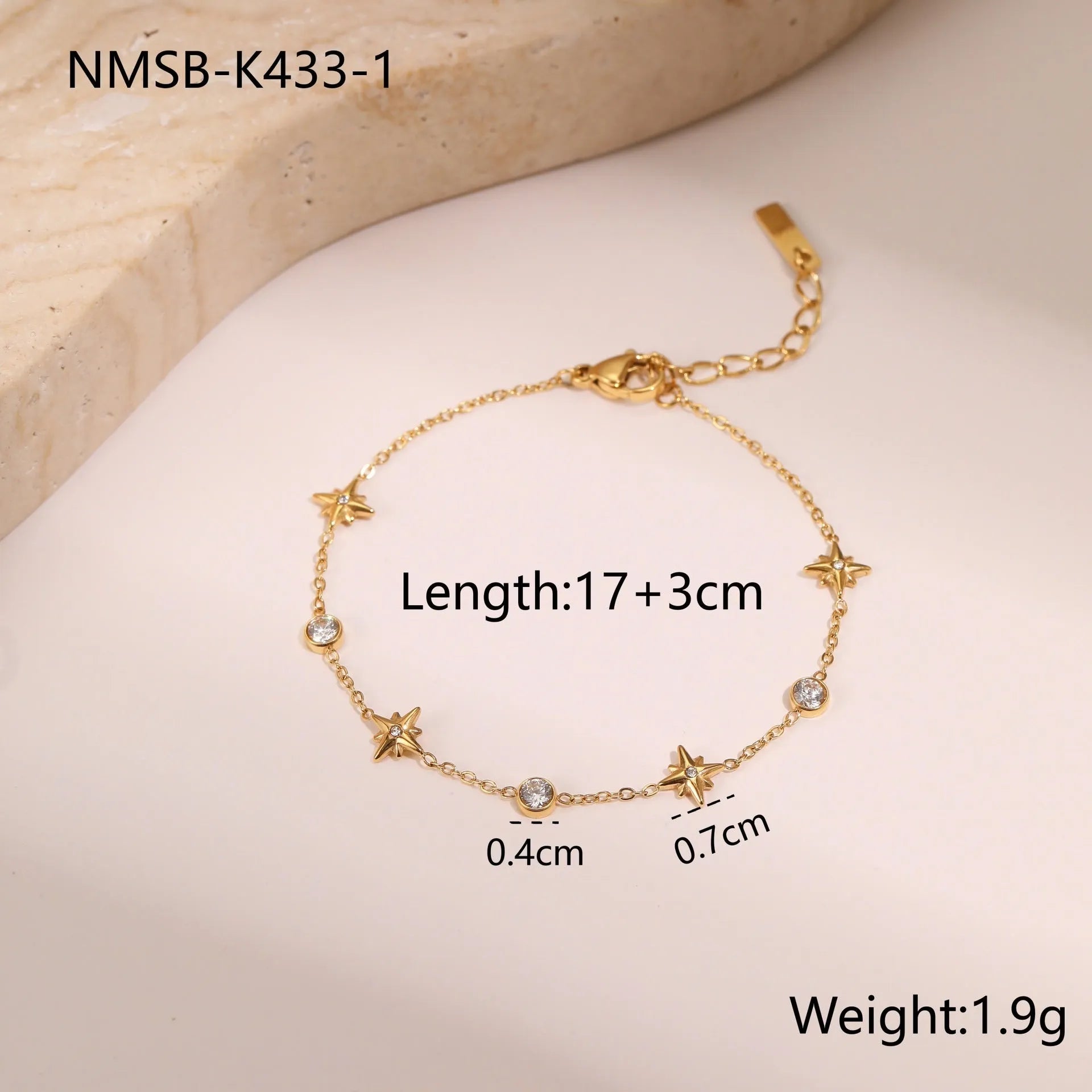 Women's gold-plated bracelet with a geometric zircon star pendant on a stainless steel chain.