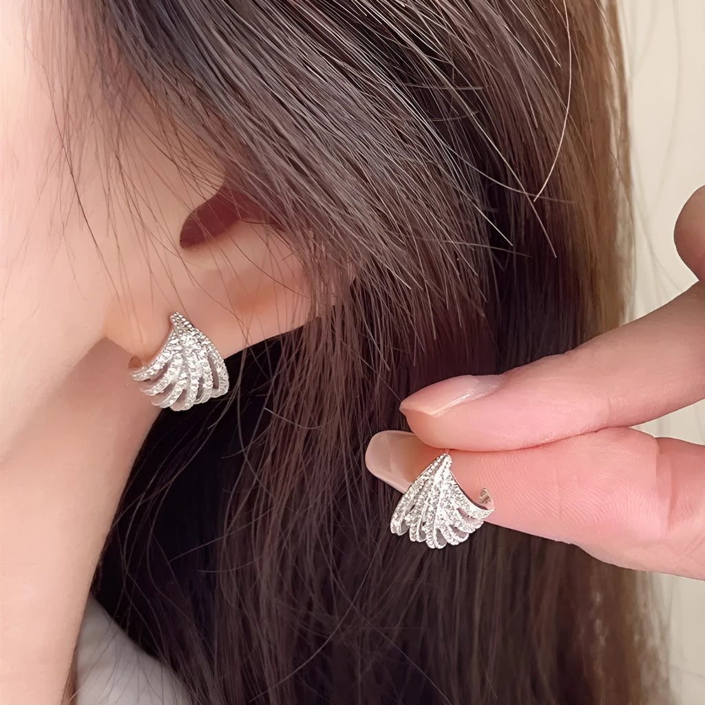 Women's platinum electroplated geometric earrings with line design and zircon details