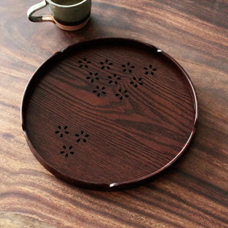 Wooden dessert plate with hollow cherry blossom pattern measuring 30 cm diameter