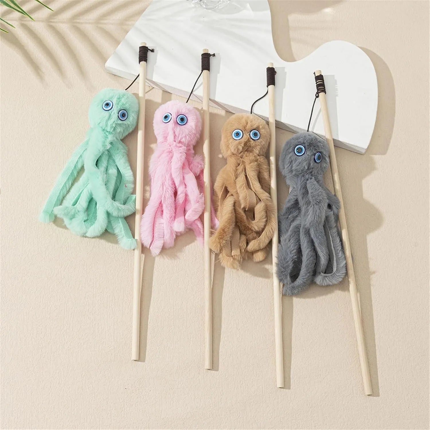 Furry octopus cat toy with eyes on 40cm long stick in pink colour for kitten play