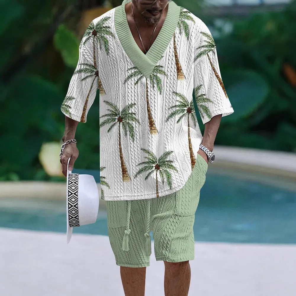 Man wearing a loose fit casual short sleeve top and matching shorts suit set