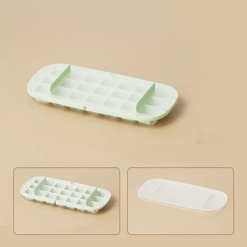 High-capacity plastic ice cube tray with grid pattern and ice shovel, shown in blue colour.