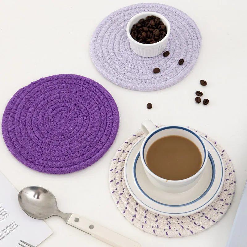 Set of three round cotton cord coasters in blue colour, each measuring 18cm diameter