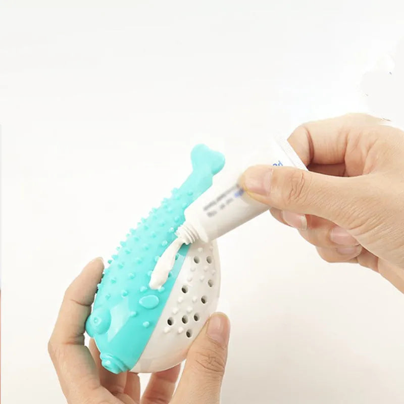 Mint Toys blue silicone fish-shaped cat chew toy and teaser on a white background.
