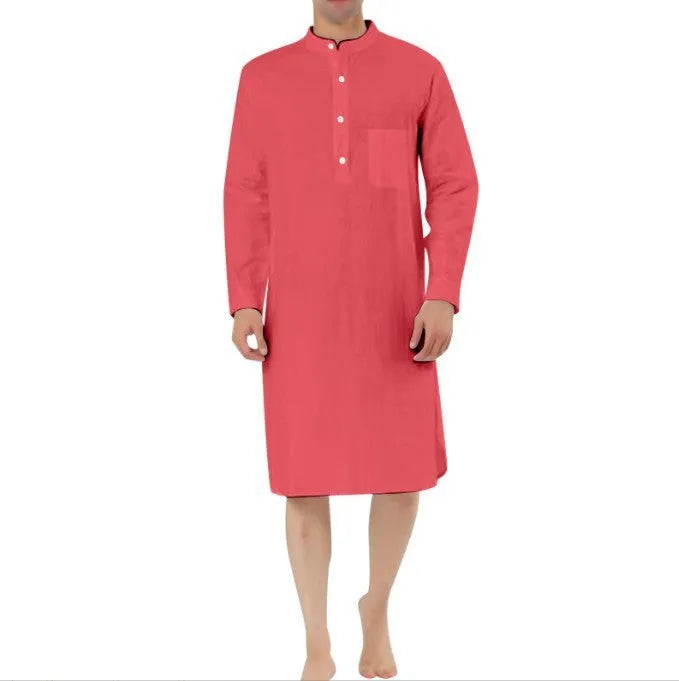 A man's long-sleeve cotton shirt robe in a light blue colour, showing a button front and chest pocket.