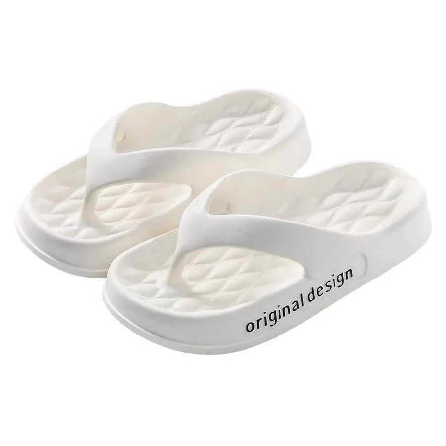 Men's EVA flip flops in various colours on a sandy beach background.
