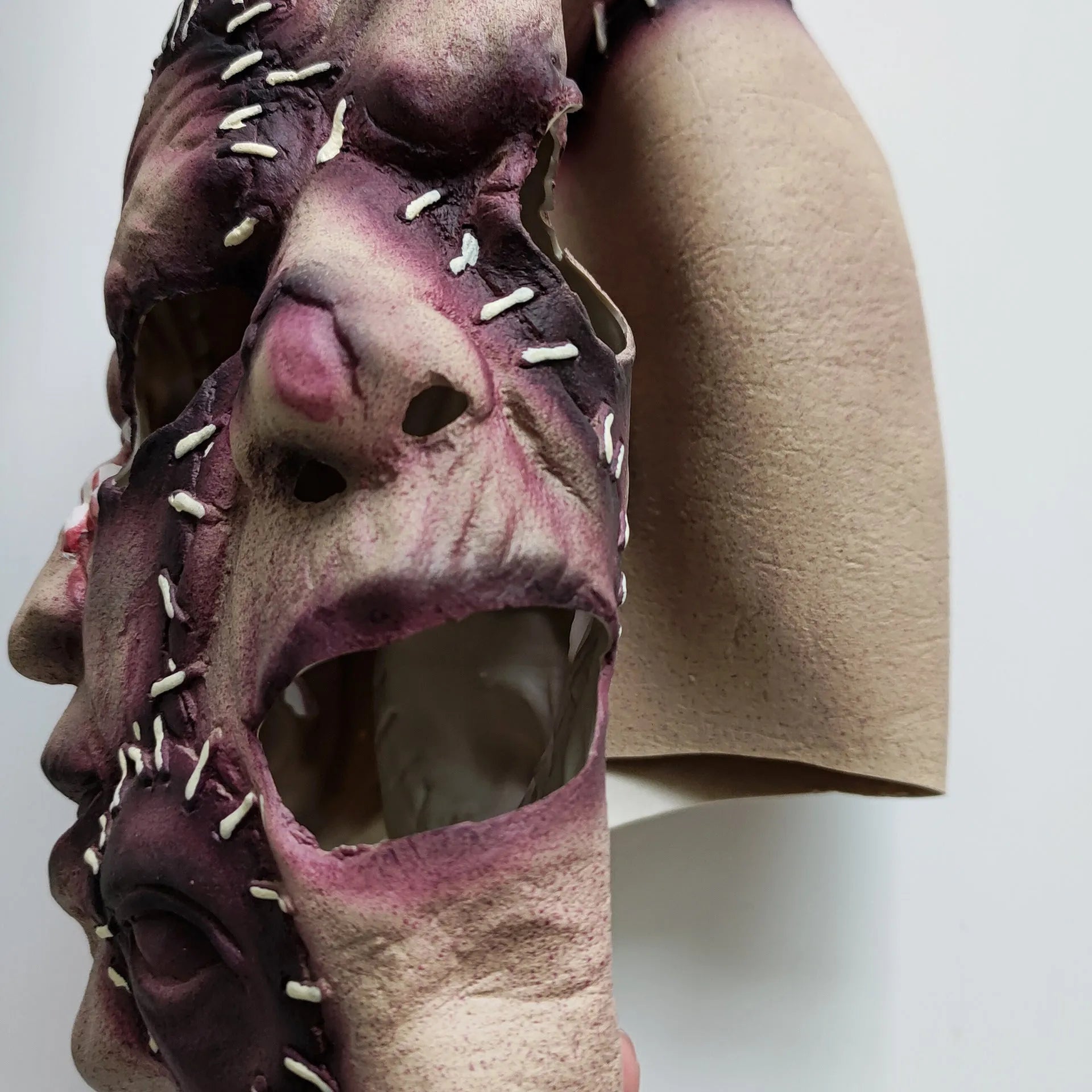 Halloween three-sided grimace horror mask made from plastic and latex