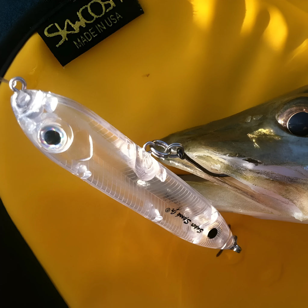 Transparent 9.5cm long ABS plastic blank lure body with a 7mm eye hole for DIY fishing bait creation.