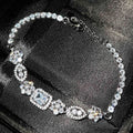 Women's sterling silver plated bracelet with zircon inlaid stones in geometric luxury style