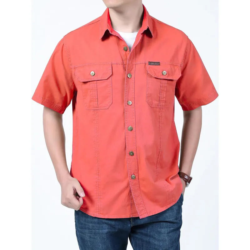 Men's cotton short sleeve loose fit cardigan shirt in dark blue on a model, summer workwear style