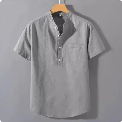 Men's beige casual stand collar short sleeve shirt made from slub linen blend fabric.