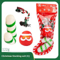 Christmas vinyl dog toy set with Santa Claus heads, trees, tennis balls, and bite ropes