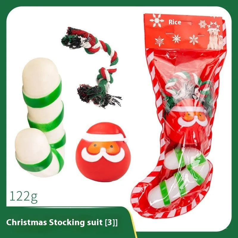 Christmas vinyl dog toy set with Santa Claus heads, trees, tennis balls, and bite ropes