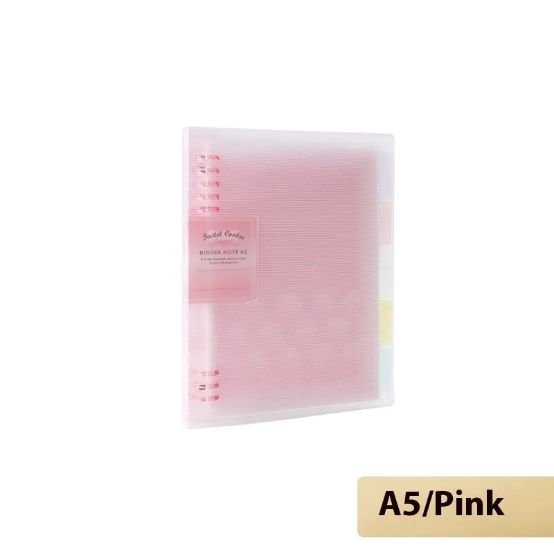 Loose-leaf spiral notebook with PP cover open, showing raw wood pulp pages in A5 or B5 size.