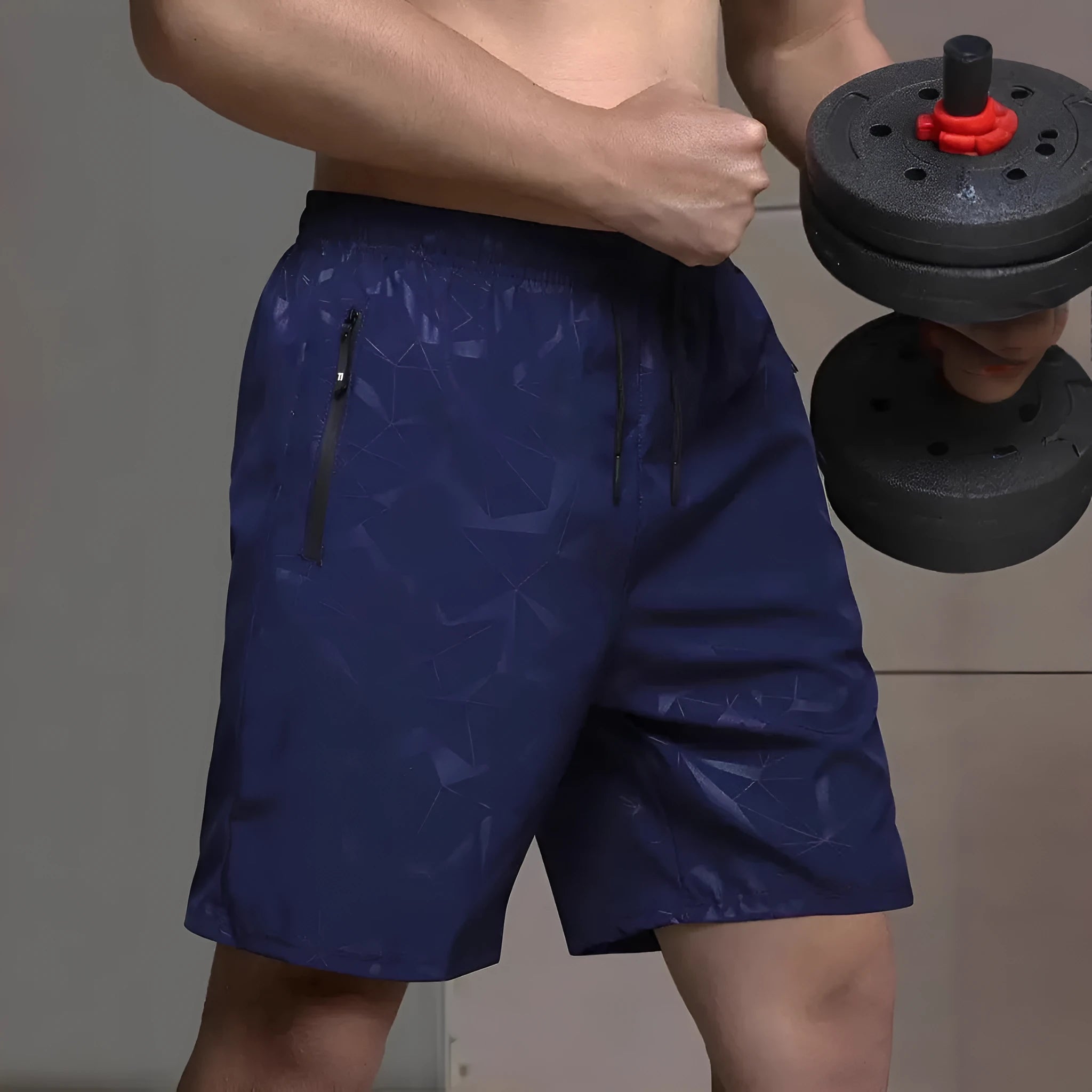 Man wearing loose-fit black printed polyester sports shorts for casual athletic wear.