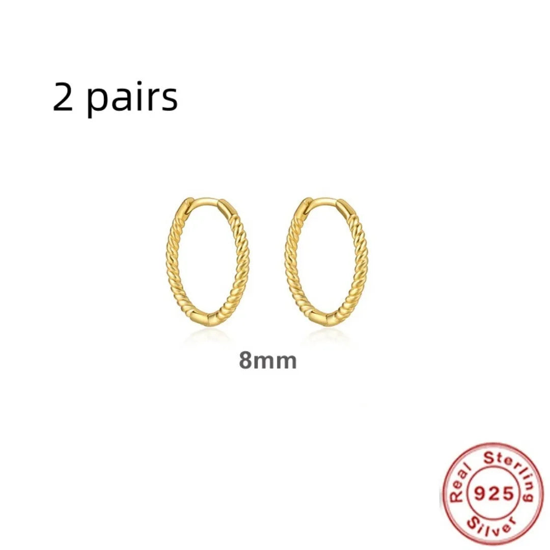 Sterling silver twisted hipster earrings in geometric round design with gold or platinum plating