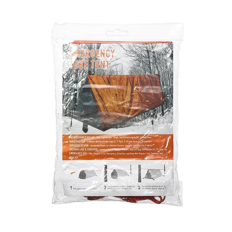 Orange emergency relief tent with sleeping bag and raincoat in temporary outdoor shelter setup