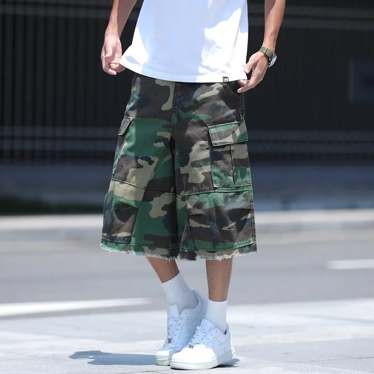 Retro American style camouflage workwear shorts in loose fit cropped design