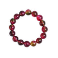 Handmade watermelon crystal bead bracelet with pastoral design elements on wrist