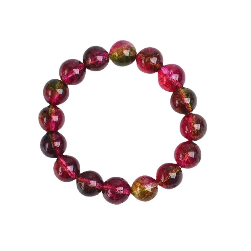 Handmade watermelon crystal bead bracelet with pastoral design elements on wrist