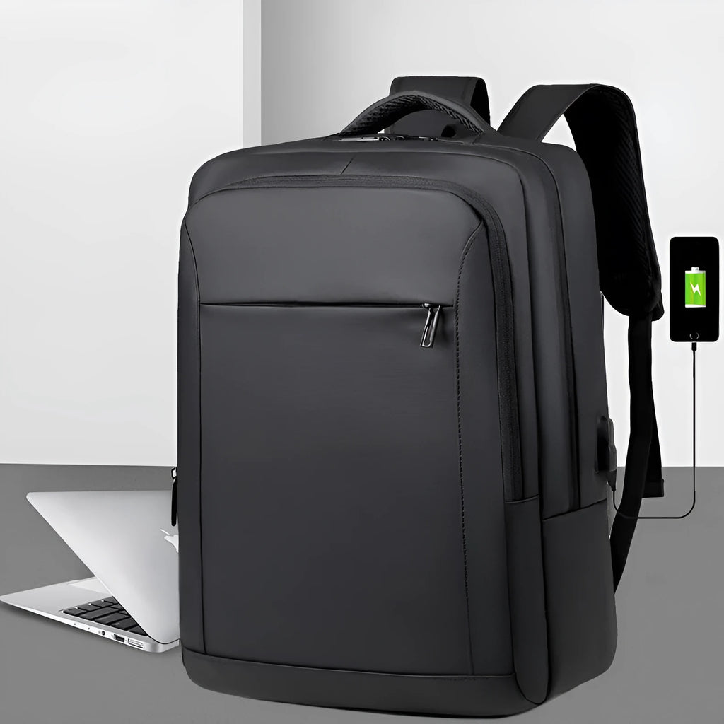 Waterproof laptop backpack in black with USB port and air pillow belt, 20-35L capacity
