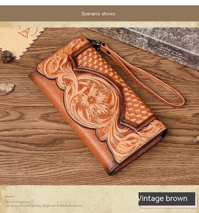 Women's retro brown tri-fold leather wallet with an embossed Chinese floral pattern, shown open.