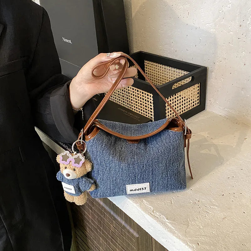 Fashion retro denim small crossbody bag in black with slit pocket and pendant