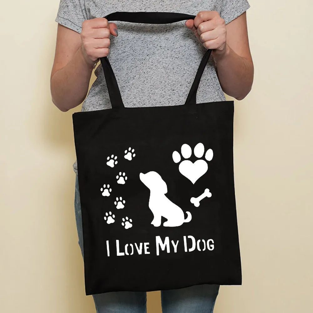 Sausage dog printed canvas bag in black with white dog design on front, sturdy tote for everyday use