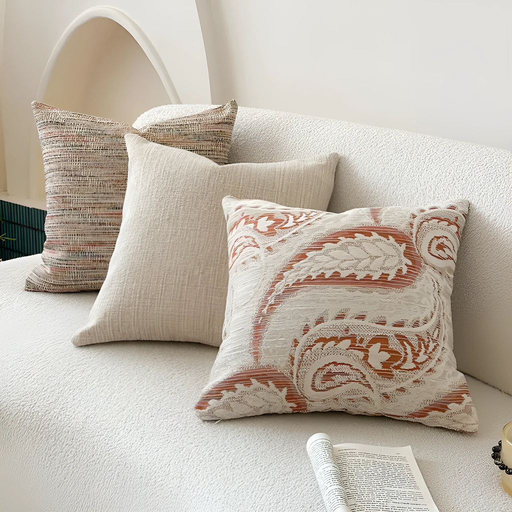 Amber jacquard paisley patterned sofa cushion cover with botanical floral design.