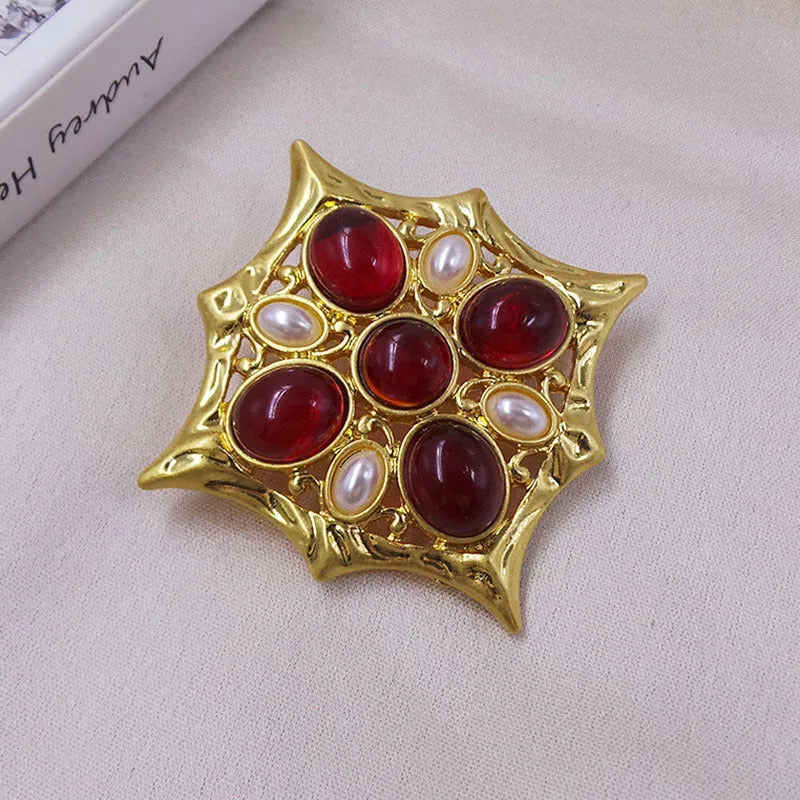 A vintage-style medieval baroque crystal brooch made from zinc alloy, shown in one of eight available colour options.