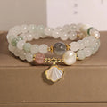 Tianshan emerald green crystal bracelet with gold-plated apricot leaf pendant and rhinestone details