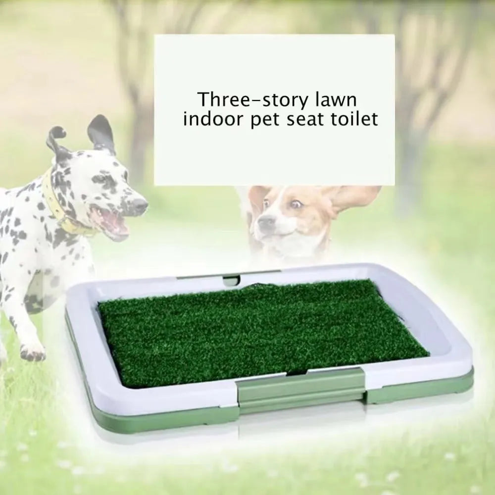 Green synthetic grass dog toilet training tray with plastic base and absorbent pad layer.