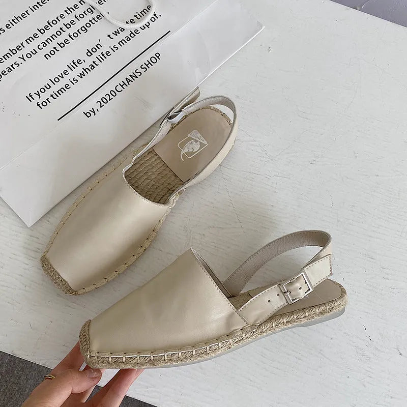 Women's beige canvas flat sandals with a retro fisherman design and superfine fibre lining.
