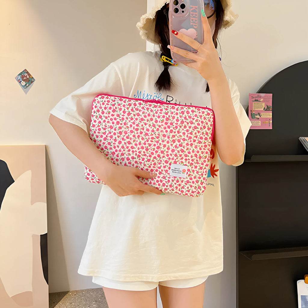 Women's printed cloth laptop bag with floral pattern showing anti-shock protection and storage compartments