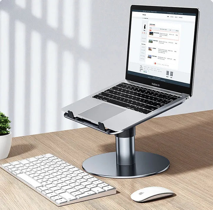 Silver adjustable aluminium car laptop stand with rotating base and non-slip pads.